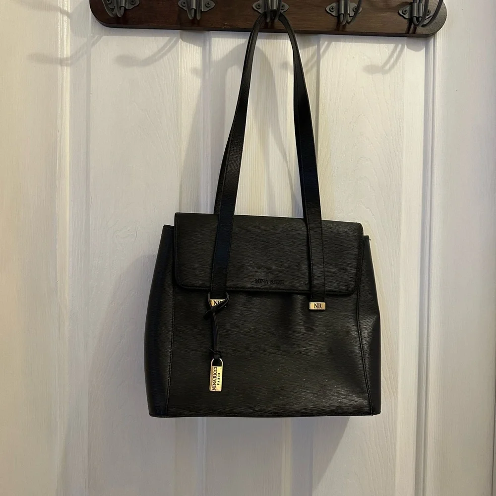 Nina Ricci Black Shoulder Bag with Structured Design and Gold Hardware